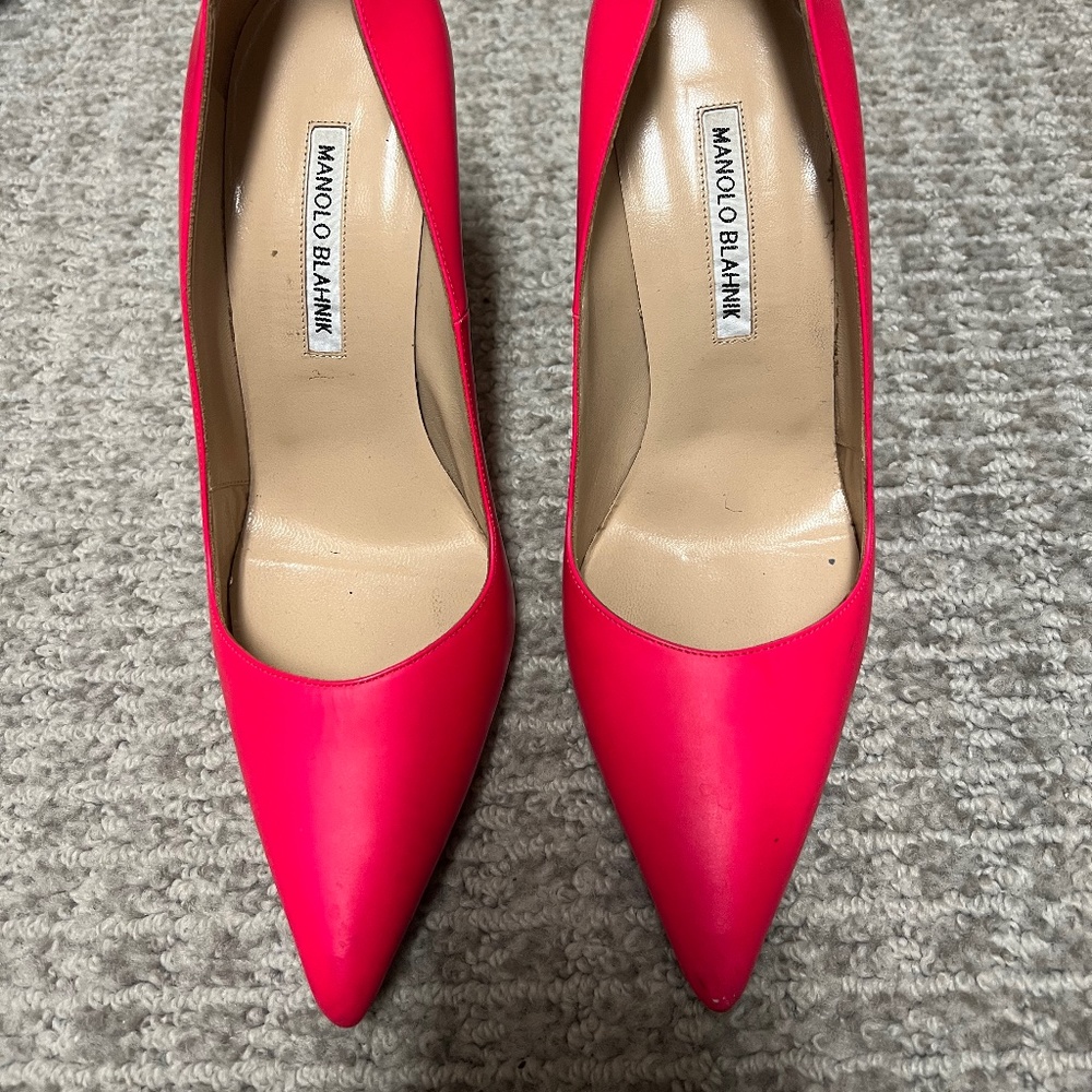 Monolo Blahnik hot pink pumps